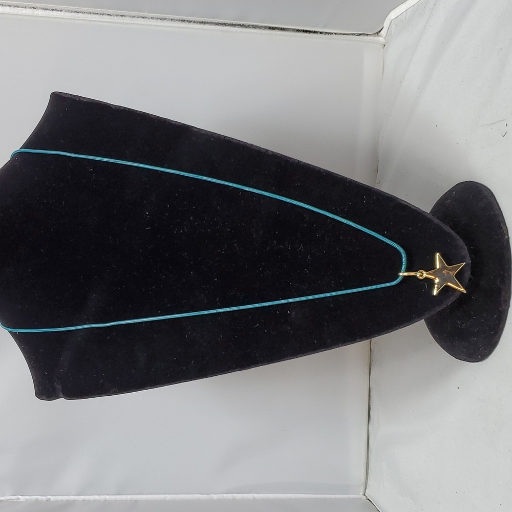 French connection teal chain with gold star necklace